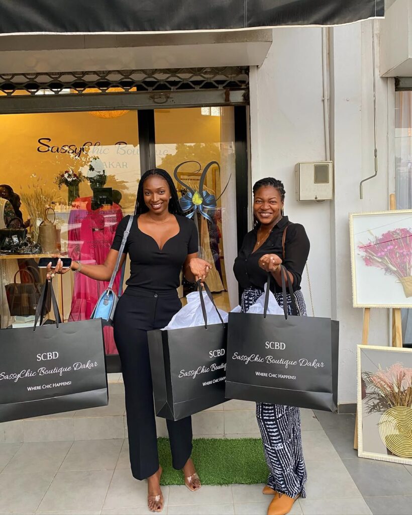Outside SCBD Customers with shopping bags outside SCBD (Sassy Chic Boutique Dakar)